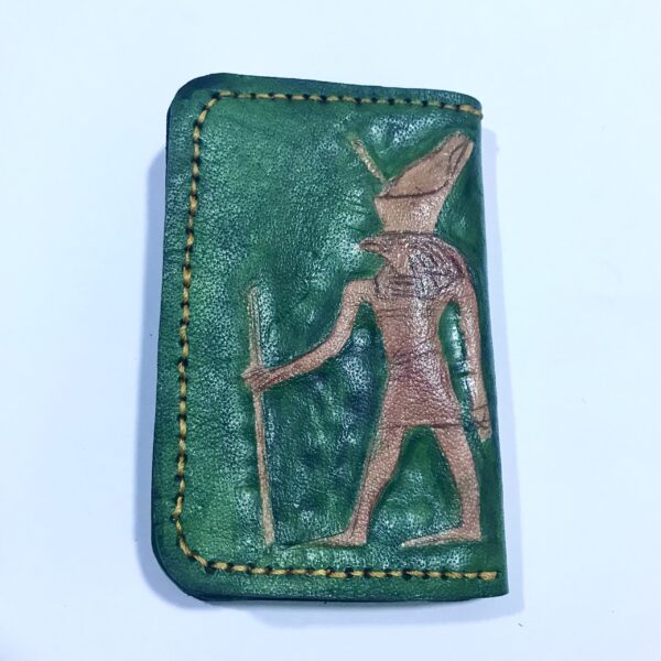 1FC0C95E-25D9-4025-A1B0-3EDE51242F3A حافظة كروت جلد طبيعي أخضر بنقش فرعوني بارز بالدق والتقبيب | صناعة يدوية فاخرة